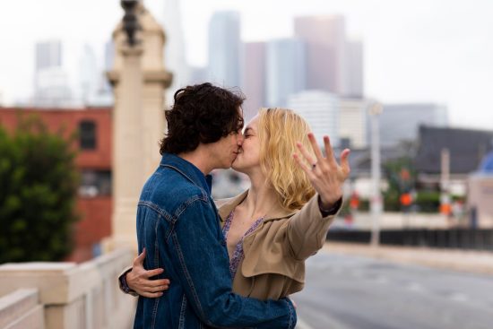 happy-couple-posing-outdoors-city-with-engagement-ring_23-2149488168