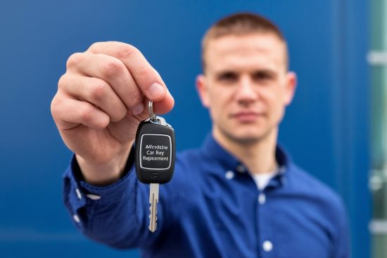 a-photo-of-a-man-holding-a-car-key-again_fawyei4aRaaEMTWSsXkHGg_CwlbndQfS6G7C_Zzq5Q_gA