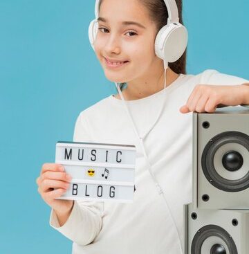 portrait-young-blogger-with-headphones_23-2148586350