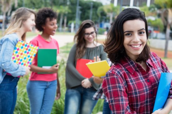 Optimized-bigstock-Hispanic-Female-Student-With-G-232863925