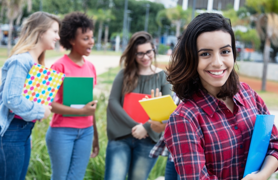 Optimized-bigstock-Hispanic-Female-Student-With-G-232863925